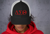 NEW-𝚫𝚺Θ Black/White Trucker Cap