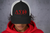 NEW-𝚫𝚺Θ Black/White Trucker Cap